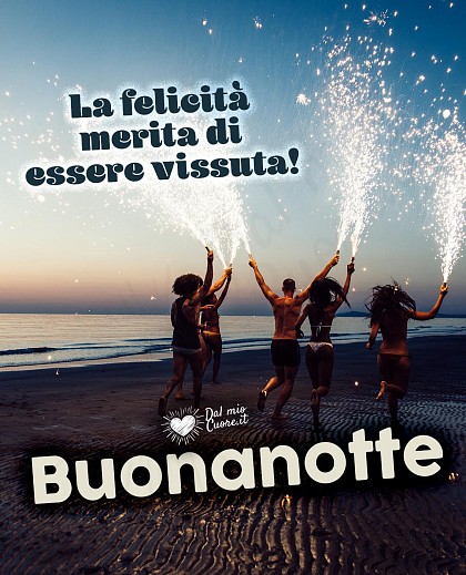 Atmosfera serale rilassante con luci soffuse e la frase La felicità merita di essere vissuta! Buonanotte.